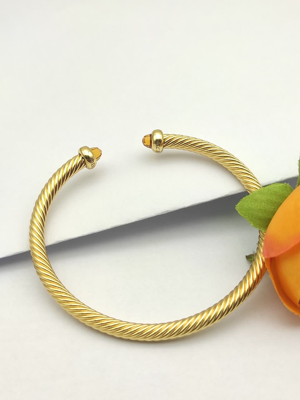 David Yurman Gold Tone Wire Bangle Bracelet with Orange Crystal Accents